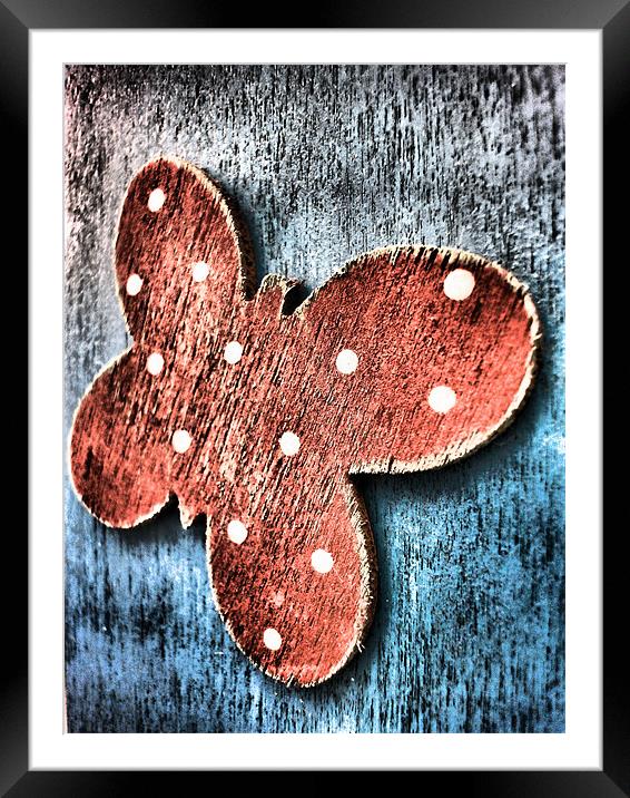 red wooden butterfly Framed Mounted Print by Heather Newton