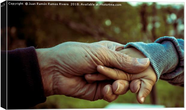 Grandfather and grandson holding hands Canvas Print by Juan Ramón Ramos Rivero