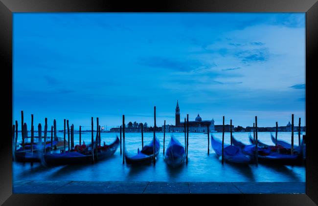 Moving Gondolas  at Twilight, Venice. Framed Print by Maggie McCall