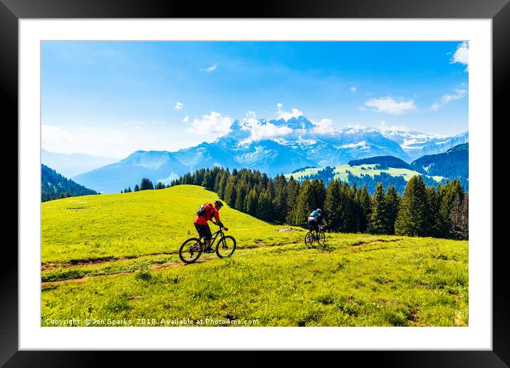 Mountain bikers and Dents du Midi Framed Mounted Print by Jon Sparks