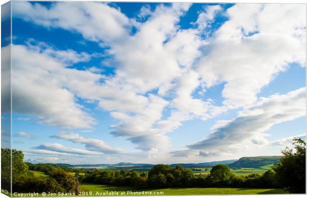 Clouds over the Lyth Valley Canvas Print by Jon Sparks
