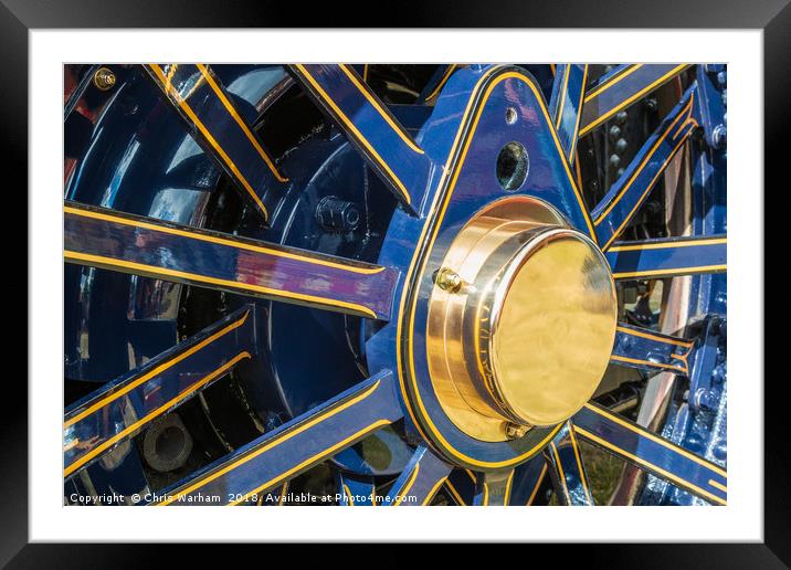 Blue and brass steam traction engine wheel Framed Mounted Print by Chris Warham