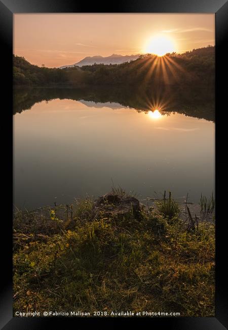 The sunset over the lake Framed Print by Fabrizio Malisan