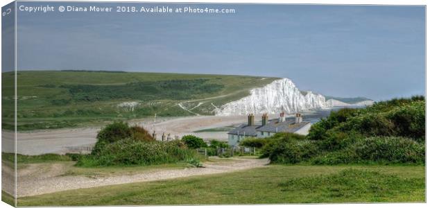 The Seven Sisters and Coastguard Cottages at Cuckm Canvas Print by Diana Mower