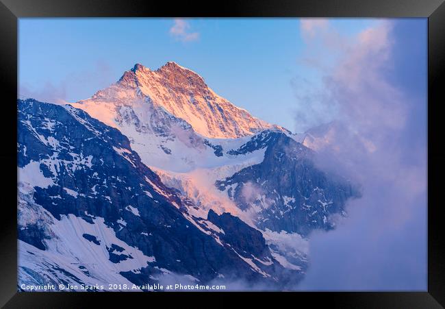 Evening light and mist on the Jungfrau Framed Print by Jon Sparks