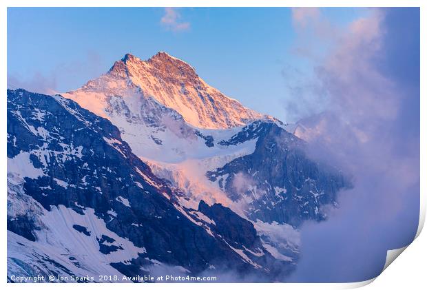Evening light and mist on the Jungfrau Print by Jon Sparks
