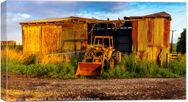 Old barn and tractor Canvas Print by Jon Sparks