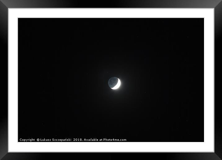 Moon's grey light against dark starry sky backgrou Framed Mounted Print by Łukasz Szczepański