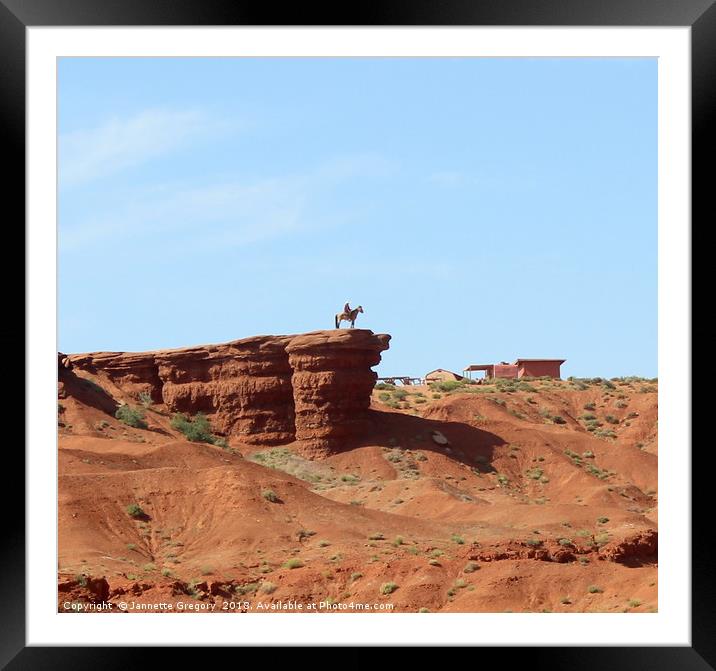 Lone cowboy in Monument Valley Framed Mounted Print by Jannette Gregory