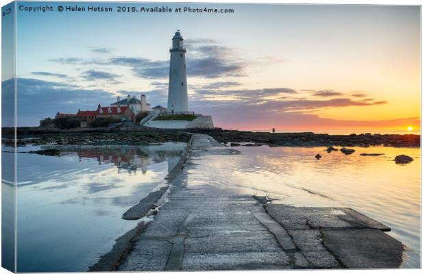 Stunning Sunrise over St Mary's Lighthouse Canvas Print by Helen Hotson
