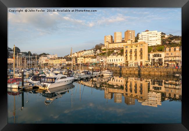 Torquay Harbour Reflections Framed Print by John Fowler