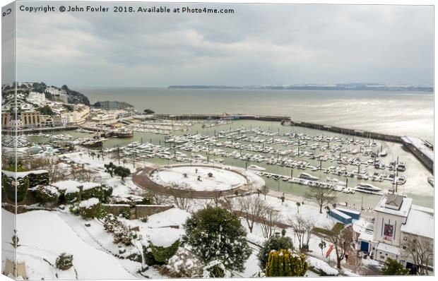 Torquay Harbour In The Snow Canvas Print by John Fowler