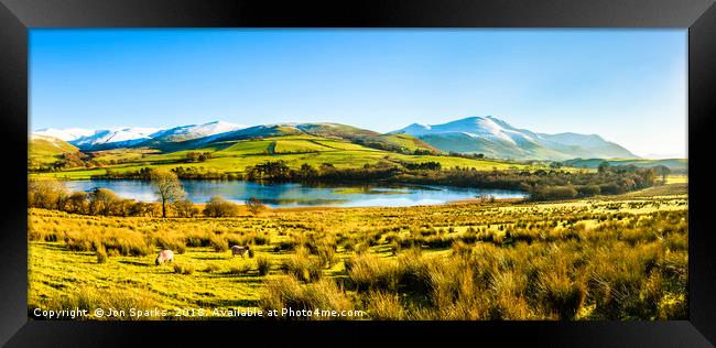 Over Water and Skiddaw Framed Print by Jon Sparks