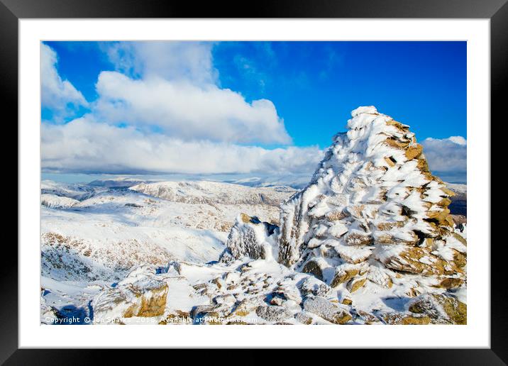 Snowy cairn on Swirl How Framed Mounted Print by Jon Sparks