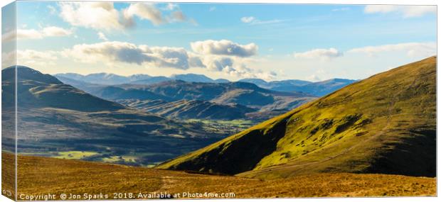 Between Souther Fell and Blencathra Canvas Print by Jon Sparks