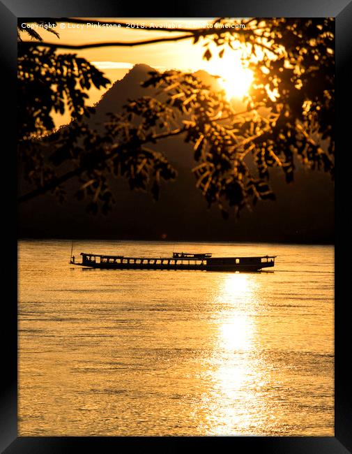 Sunset over the Mekong River Framed Print by Lucy Pinkstone