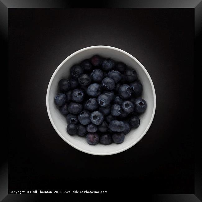 Still life of a bowl of Blueberries. Framed Print by Phill Thornton