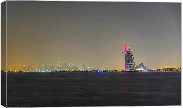 Dubai By Night Canvas Print by Gary chadbond