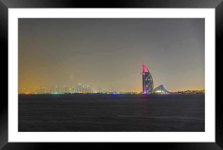 Dubai By Night Framed Mounted Print by Gary chadbond