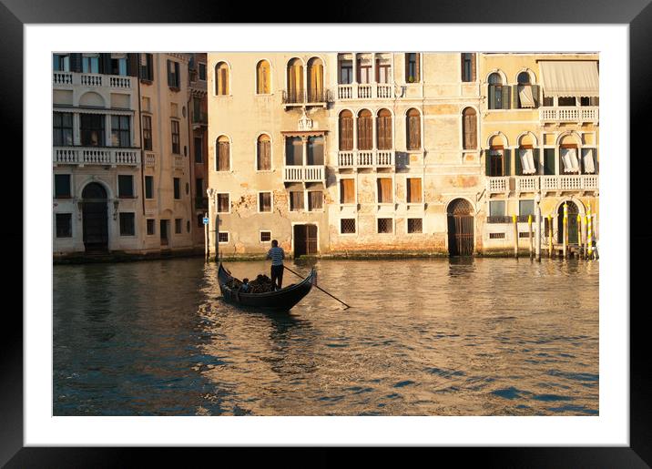 Silhouette of a gondola in evening sun Framed Mounted Print by Andrew Michael