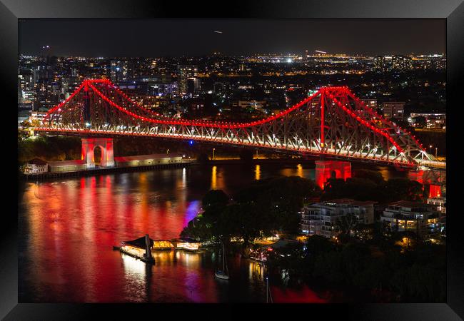 Aerial view of Story Bridge lit after dark Framed Print by Andrew Michael