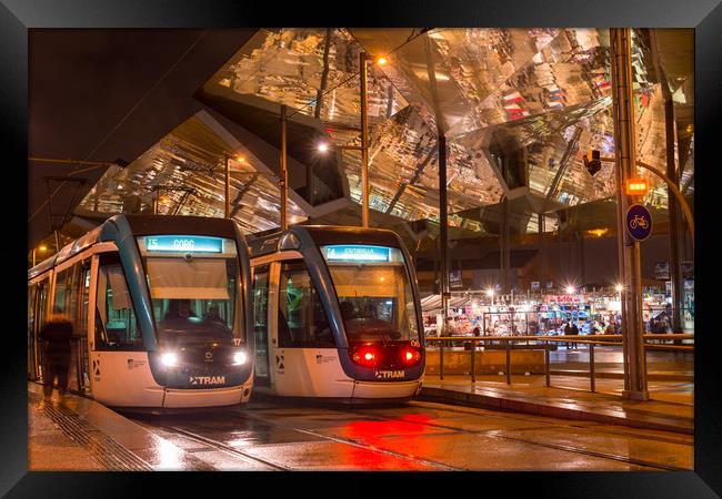 Barcelona trams at night Framed Print by Andrew Michael