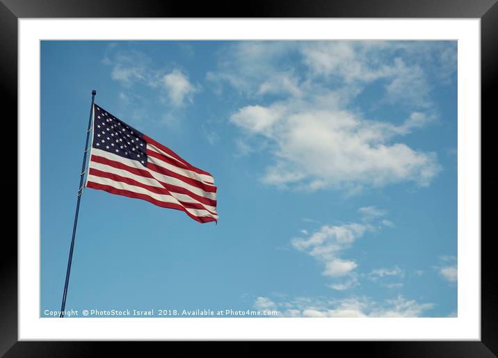 Americav flag with clouds and blue sky background Framed Mounted Print by PhotoStock Israel
