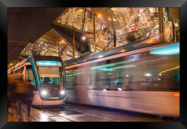 Night view of two trams at Glories station Framed Print by Andrew Michael