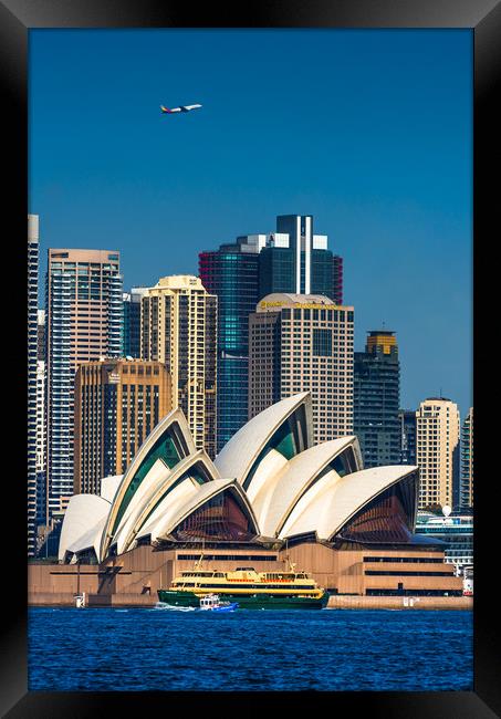 Ferry, water taxi and airplane passing by Framed Print by Andrew Michael