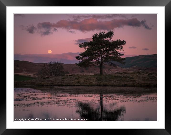 Full moon setting at sunrise in The Lake District Framed Mounted Print by Geoff Beattie