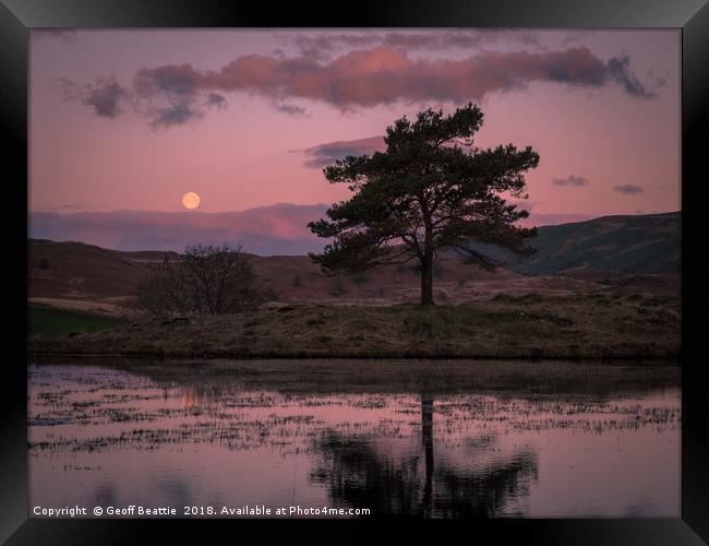 Full moon setting at sunrise in The Lake District Framed Print by Geoff Beattie
