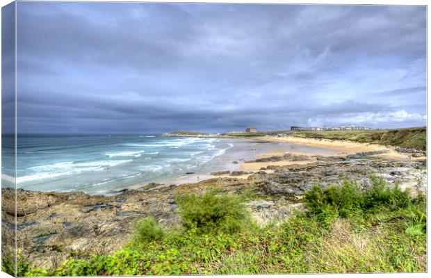 Storm clouds over Fistral Beach Canvas Print by David Stanforth