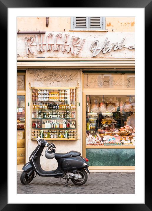 Vespa scooter outside traditional Grocery store Framed Mounted Print by Andrew Michael