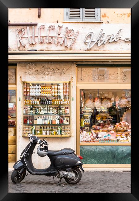 Vespa scooter outside traditional Grocery store Framed Print by Andrew Michael
