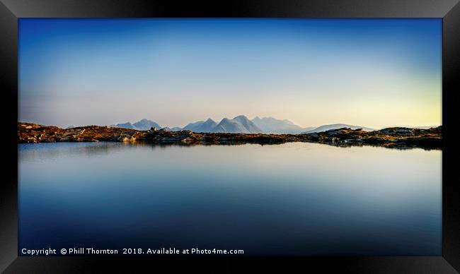 View across Loch na Clarlaich to the Isle of Skye. Framed Print by Phill Thornton