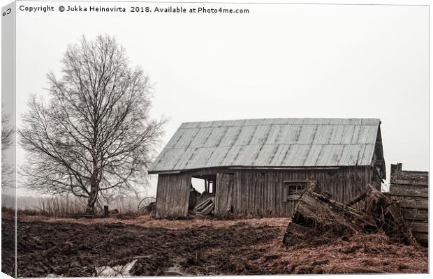 Barn House On The Rainy Fields Canvas Print by Jukka Heinovirta