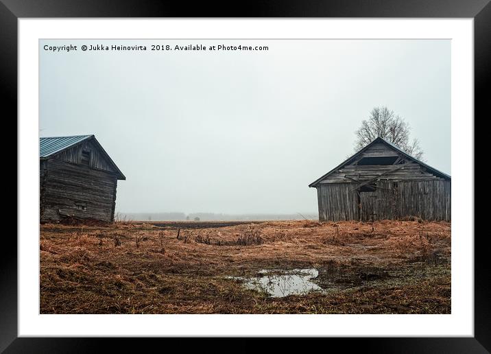 Two Old Barn Houses On The Rainy Fields Framed Mounted Print by Jukka Heinovirta