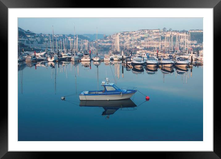 Sunrise over boats moored in Brixham harbour Framed Mounted Print by Steve Mantell