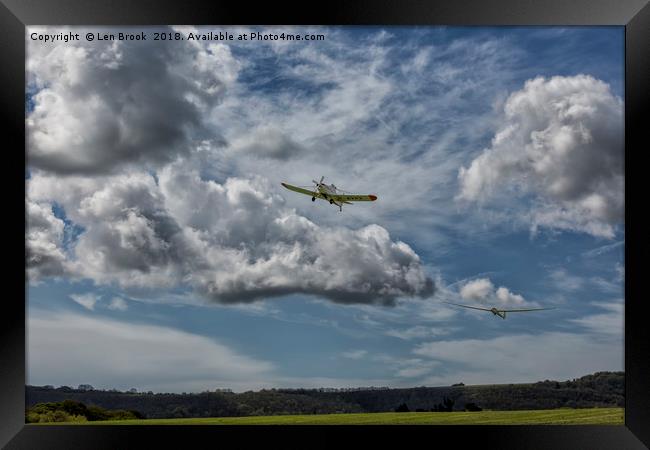 Glider and Tug Taking Off Framed Print by Len Brook