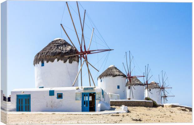 Iconic windmills, Mykonos, Greece Canvas Print by Kevin Hellon