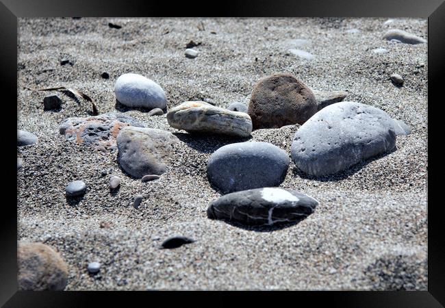 Pebbles on a Cretan Beach Framed Print by Peter Elliott 