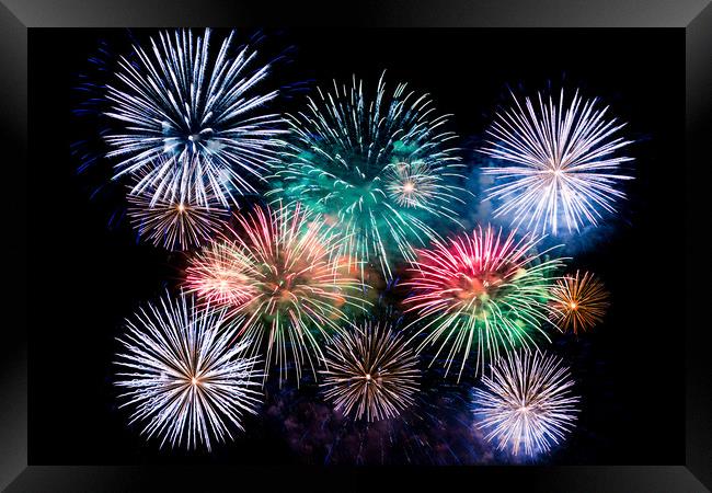 Colorful explosions of festive fireworks Framed Print by Dobrydnev Sergei