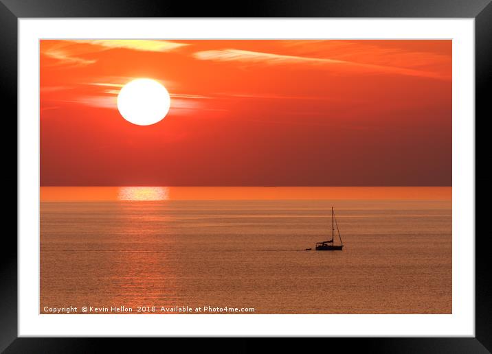 Sun setting Framed Mounted Print by Kevin Hellon