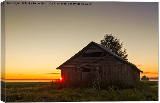 Midsummer Sunset Behind A Barn House Canvas Print by Jukka Heinovirta
