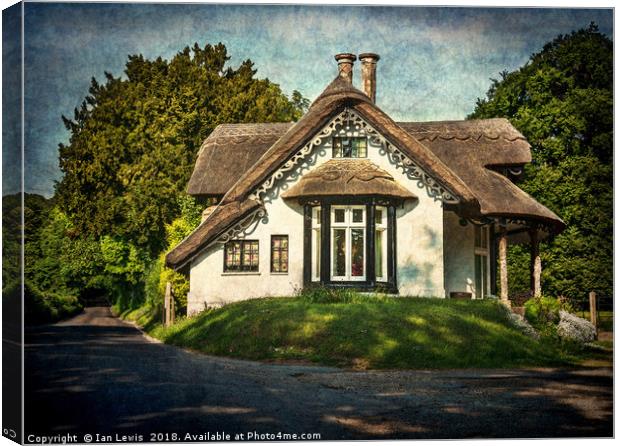 A  Thatched Cottage At Sulham Canvas Print by Ian Lewis
