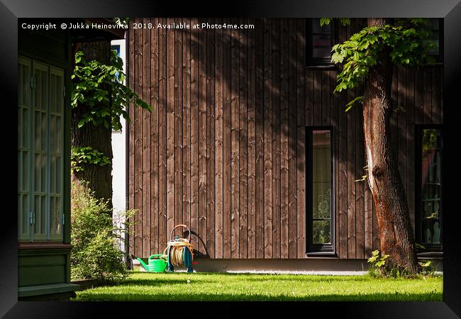 Garden Tools Beside A Modern Building Framed Print by Jukka Heinovirta