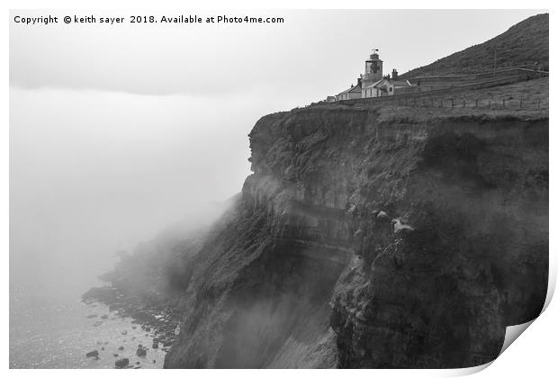 Whitby Lighthouse as the fog rolls in Print by keith sayer