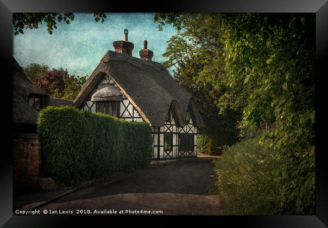 Enchanting Sulham Thatched Cottage Framed Print by Ian Lewis