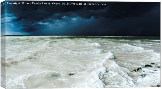 Storm sky on the beach of Sanlucar de Barrameda at Canvas Print by Juan Ramón Ramos Rivero