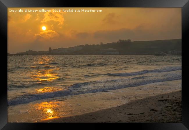 Sunrise over Swanage Bay Framed Print by Linsey Williams
